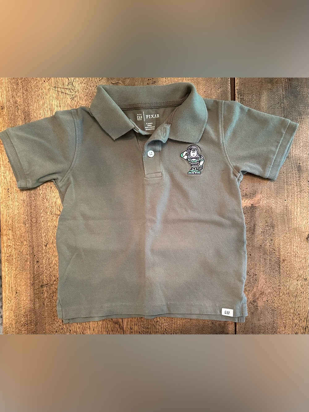 EUC Gap Baby Pixar Buzz Lightyear Green Polo Size 4 years.